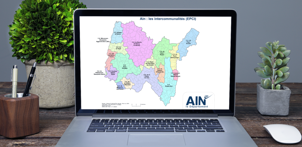 coopération-territoriale-ain ordinateur portable montrant une carte des EPCI de l'Ain